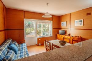 Posedenie v ubytovaní Apartamentos Ancoradoiro
