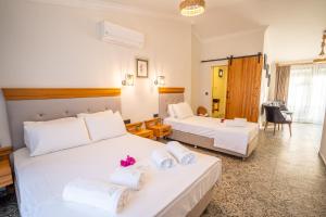 Кровать или кровати в номере Jasmine Marmaris