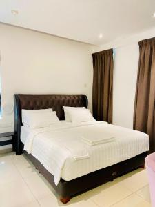 BIG TREE HOTEL客房内的一张或多张床位
