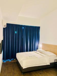 BIG TREE HOTEL客房内的一张或多张床位