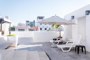 Rõdu või terrass majutusasutuses Arkana 9 Suites by Grupo Amber