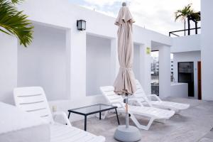 Istumisnurk majutusasutuses Arkana 9 Suites by Grupo Amber +70 fotot