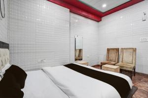 Легло или легла в стая в OYO Hotel Nandini Luxurious