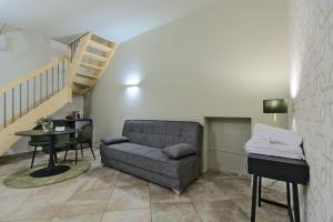 Posezení v ubytování Imola Suites