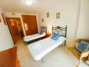 Ένα ή περισσότερα κρεβάτια σε δωμάτιο στο A3 - Atrium Beach 2 - 2004 Finestrat s.l. +22 φωτογραφίες