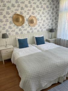 Katil atau katil-katil dalam bilik di Nautic Hotell