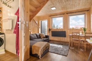 Posezení v ubytování Domek wczasowy z dostępem do Mini zoo Donkeyszot