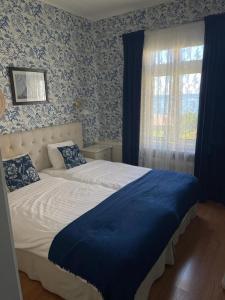 Katil atau katil-katil dalam bilik di Nautic Hotell