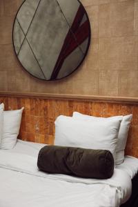 Łóżko lub łóżka w pokoju w obiekcie Hotel Botanique Breda