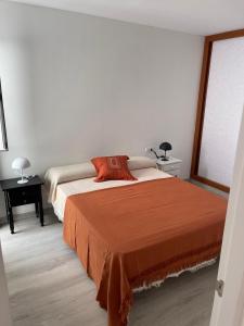 Łóżko lub łóżka w pokoju w obiekcie Apartamento Fuerteventura