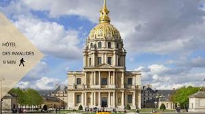 a building with a gold dome on top of it at Appartement de standing 1 – tour Eiffel/Invalides in Paris