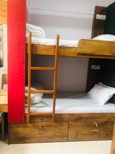 Postel nebo postele na pokoji v ubytování Everest Stays Rooms and Dormitory