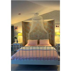 Postel nebo postele na pokoji v ubytování Buyukada Princess Hotel
