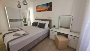 Postel nebo postele na pokoji v ubytování Apartman Joki
