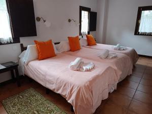 Posteľ alebo postele v izbe v ubytovaní Hotel Rural Don Burguillo