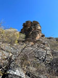 eine Felsformation an der Seite eines Berges in der Unterkunft Riverfront Resort and Camping in Shakawe