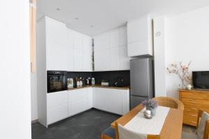 A cozinha ou cozinha compacta de Apartment May