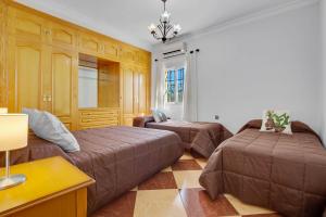 Postel nebo postele na pokoji v ubytování Casa Rural La Colina a 30 min Málaga Lovely Home + 20 fotografií