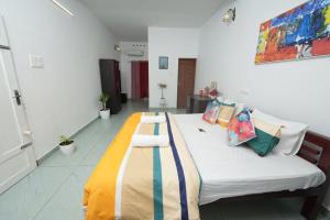 Postel nebo postele na pokoji v ubytování VILLA MANTRAA