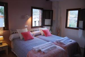 Posteľ alebo postele v izbe v ubytovaní Hotel Rural Don Burguillo