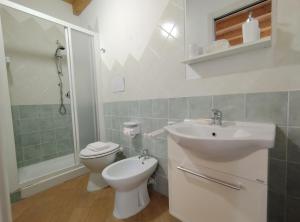 Koupelna v ubytování Holmann Suite & Rooms