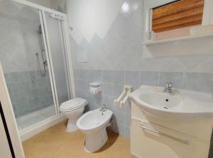 Koupelna v ubytování Holmann Suite & Rooms