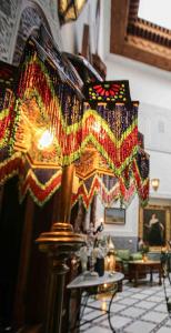 a close up of a lamp in a room at Dar Dalila Fes in Fez