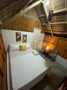 Postel nebo postele na pokoji v ubytování Seaside Cabin Bucana