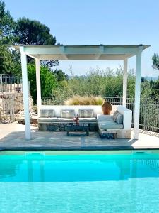 The swimming pool at or close to Trullo Falco