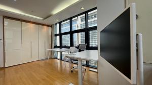 an office with two desks and large windows at COEX VIP 15 New Open [2 Queen beds] in Seoul