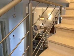 a stairway leading up to the basement of a house at VILLA DALU not only Holidays in Trani