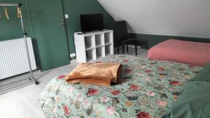 Postel nebo postele na pokoji v ubytování Chez Nadine