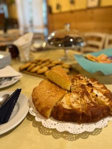 a table with a loaf of bread on a plate at Agriturismo Al Botteniga in Treviso