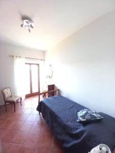 Postel nebo postele na pokoji v ubytování VANIA BLU Alloggio Turistico