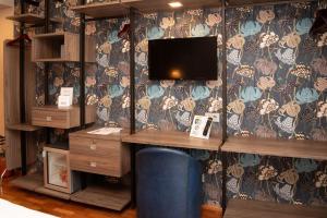TV a/nebo společenská místnost v ubytování SIRIOHotel