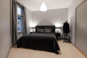 Katil atau katil-katil dalam bilik di Luxury Apartment in Oslo's Best Location