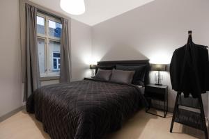 Säng eller sängar i ett rum på Luxury Apartment in Oslo's Best Location