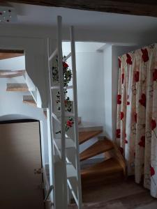 Postel nebo postele na pokoji v ubytování Comme une tour dans le centre Historique