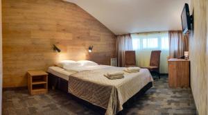 Postel nebo postele na pokoji v ubytování Hotell Wironia + 37 fotografií