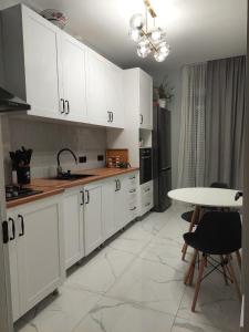 Kuchyň nebo kuchyňský kout v ubytování Moduli-Moduli