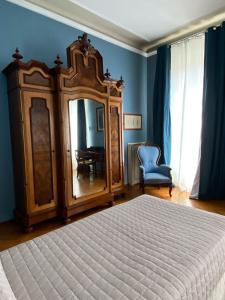 Postel nebo postele na pokoji v ubytování Residenza Scaligera