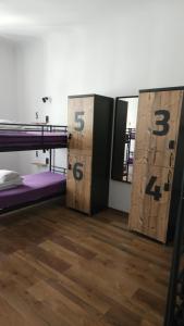 Postel nebo postele na pokoji v ubytování AdHoc Hostel