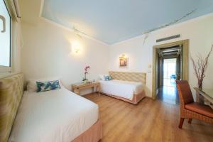 Posteľ alebo postele v izbe v ubytovaní Atrium Prestige Thalasso Spa Resort & Villas