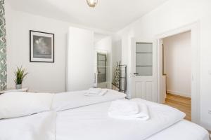 Postel nebo postele na pokoji v ubytování Old Town Center Apartments