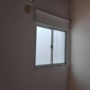 a window in the corner of a room at Los teros en Goya in Goya