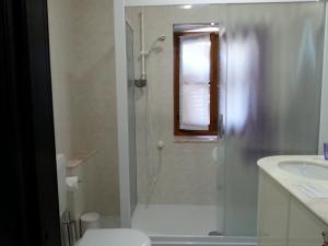 Un baño de Serbelloni Holiday Apartment 37