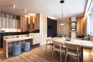 Kuchyň nebo kuchyňský kout v ubytování Wachtler Dolomite Apartments + 34 fotografií
