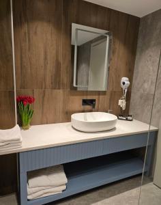 Koupelna v ubytování Perla Hotel