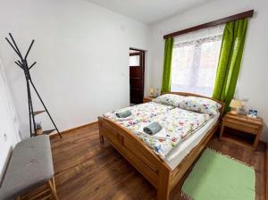 Postel nebo postele na pokoji v ubytování Casa Forrás