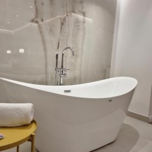 Koupelna v ubytování Perla Hotel